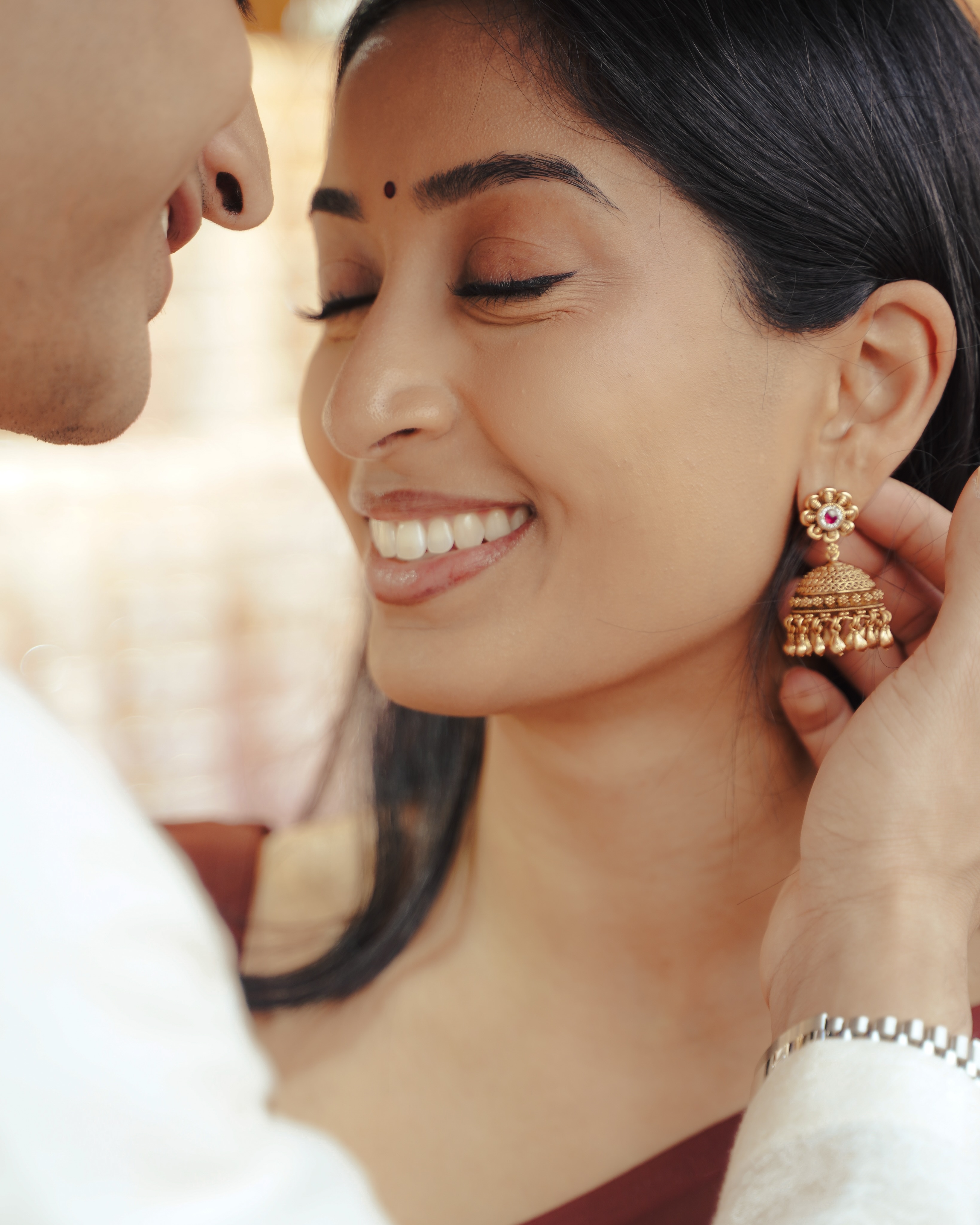 A joyful bridal portrait captured by Blissful Weddings